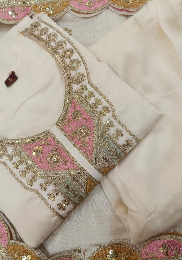 Ivory Embroidered Kurta Set with Pastel Accents